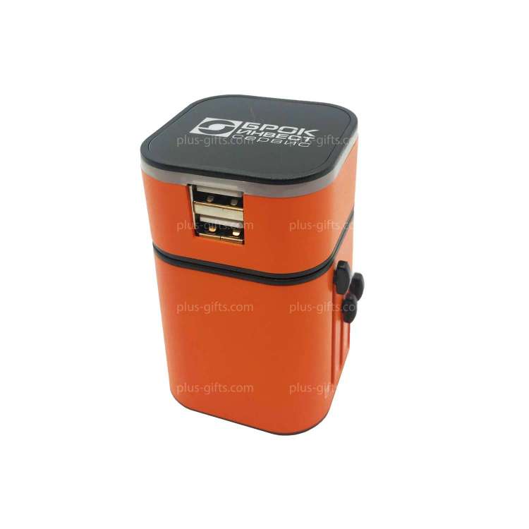 The travel adapter with the glowing logo